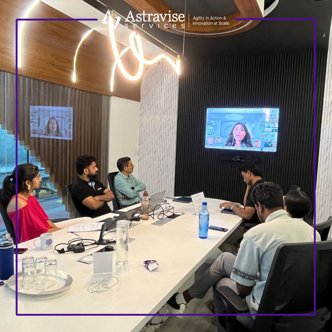 Office team engaged in Women’s Leadership webinar session focusing on inclusion, career growth, and empowerment